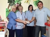 charity-handover-kelsey-gillespie-and-wullie-keaning-on-the-right-present-three-hundred-and-thirty-pounds-at-the-childrens-ward-at-dgri-march-2011-bob-little