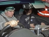 tony-and-heather-currie-watch-spongebob-squarepants-on-the-dash-mounted-tv-while-they-wait-for-their-minute-on-the-12-car-rally-240210-bob-little
